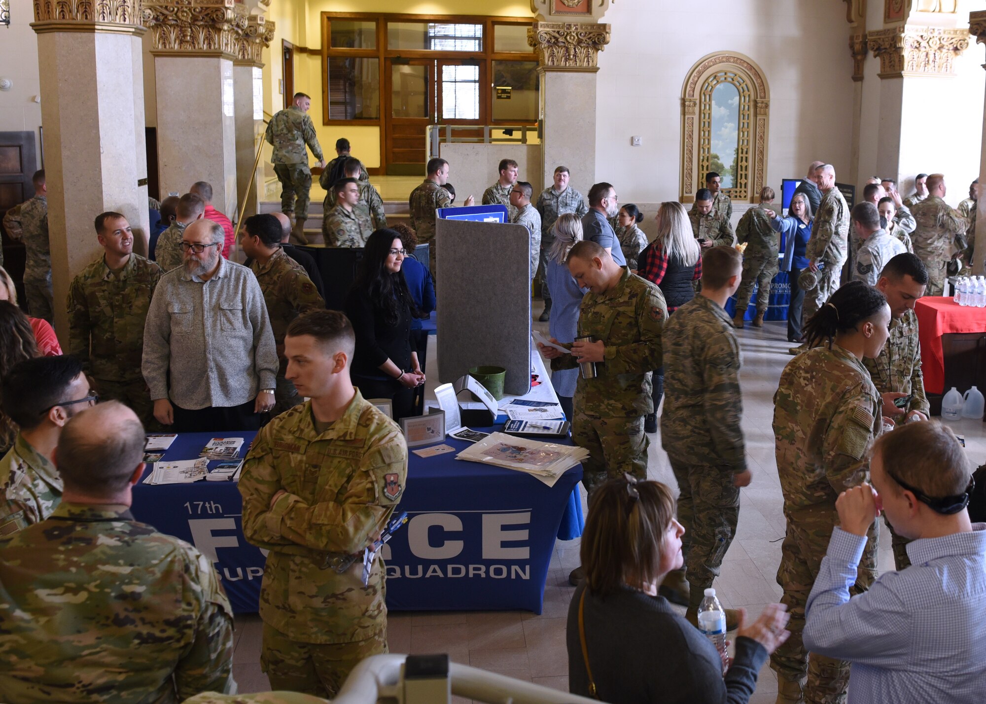 Goodfellow members socialize and view information about the base before the Commander’s Call at Murphey Performance Hall in San Angelo, Texas, Jan. 9, 2020.  Light refreshments and a variety of information booths were available before and after the event. (U.S. Air Force photo by Airman 1st Class Abbey Rieves)