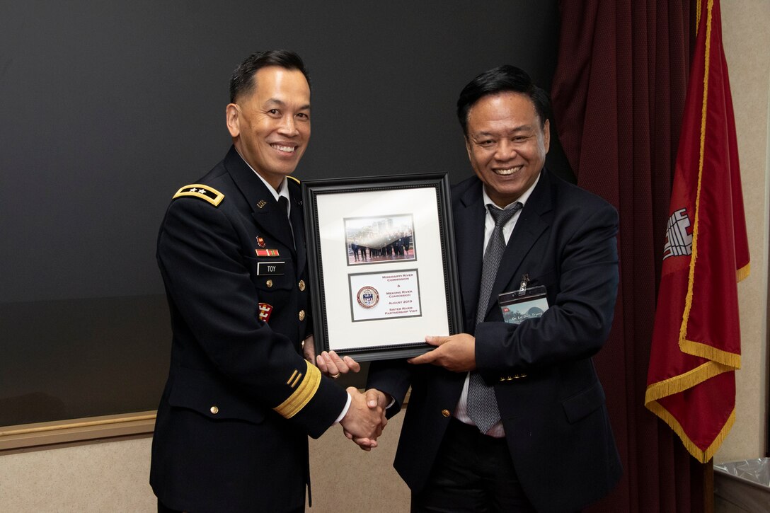 MG Toy receiving award from Mekong River Commission