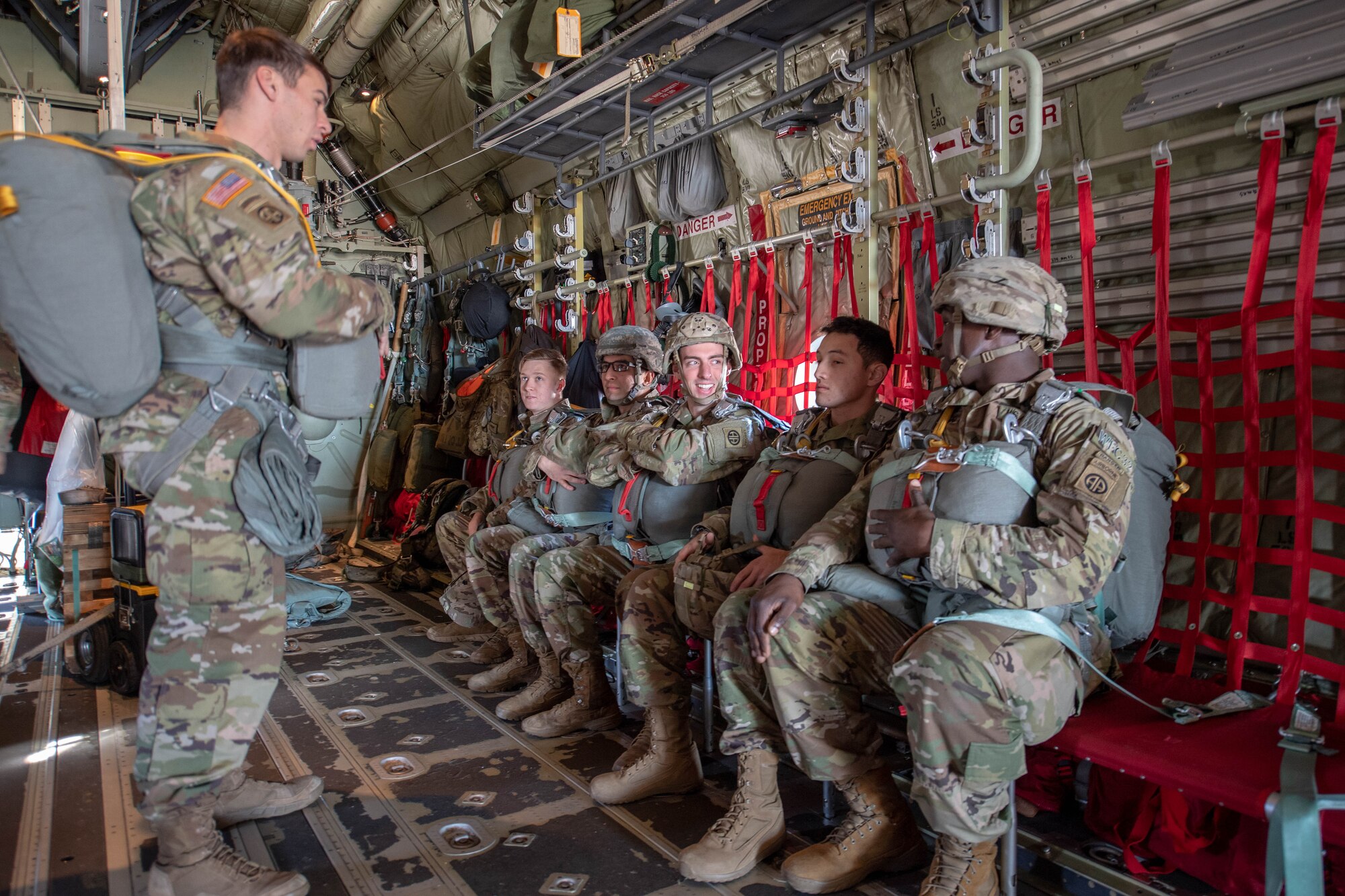 Soldiers prepare for New Year Jump aboard U.S. Air Force C-130J Super Hercules.