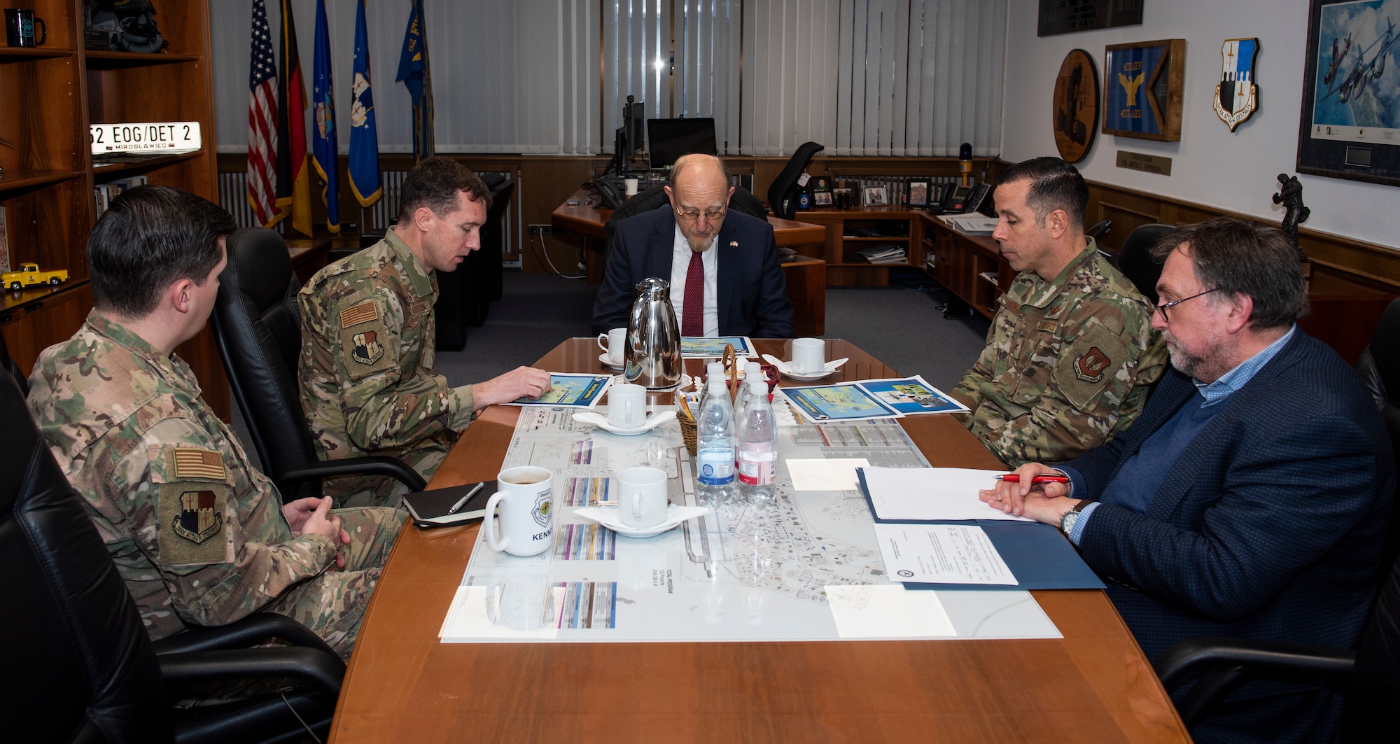 Dr. Heinrich Kreft, German ambassador to Luxembourg, center, sits in on a briefing with leadership at Spangdahlem Air Base, Germany, Jan. 13, 2020. Kreft visited the 52nd Fighter Wing to learn more about the Wing's emphasis on mission, Airmen, and community. (U.S. Air Force photo by Airman 1st Class Alison Stewart)