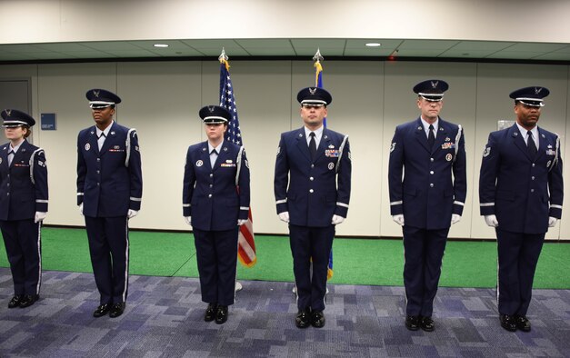 Six newly inducted ceremonial guardsmen stand at attention during the 911th Airlift Wing base honor guard graduation ceremony at the Pittsburgh International Airport Air Reserve Station, Pennsylvania, Dec. 8, 2019.