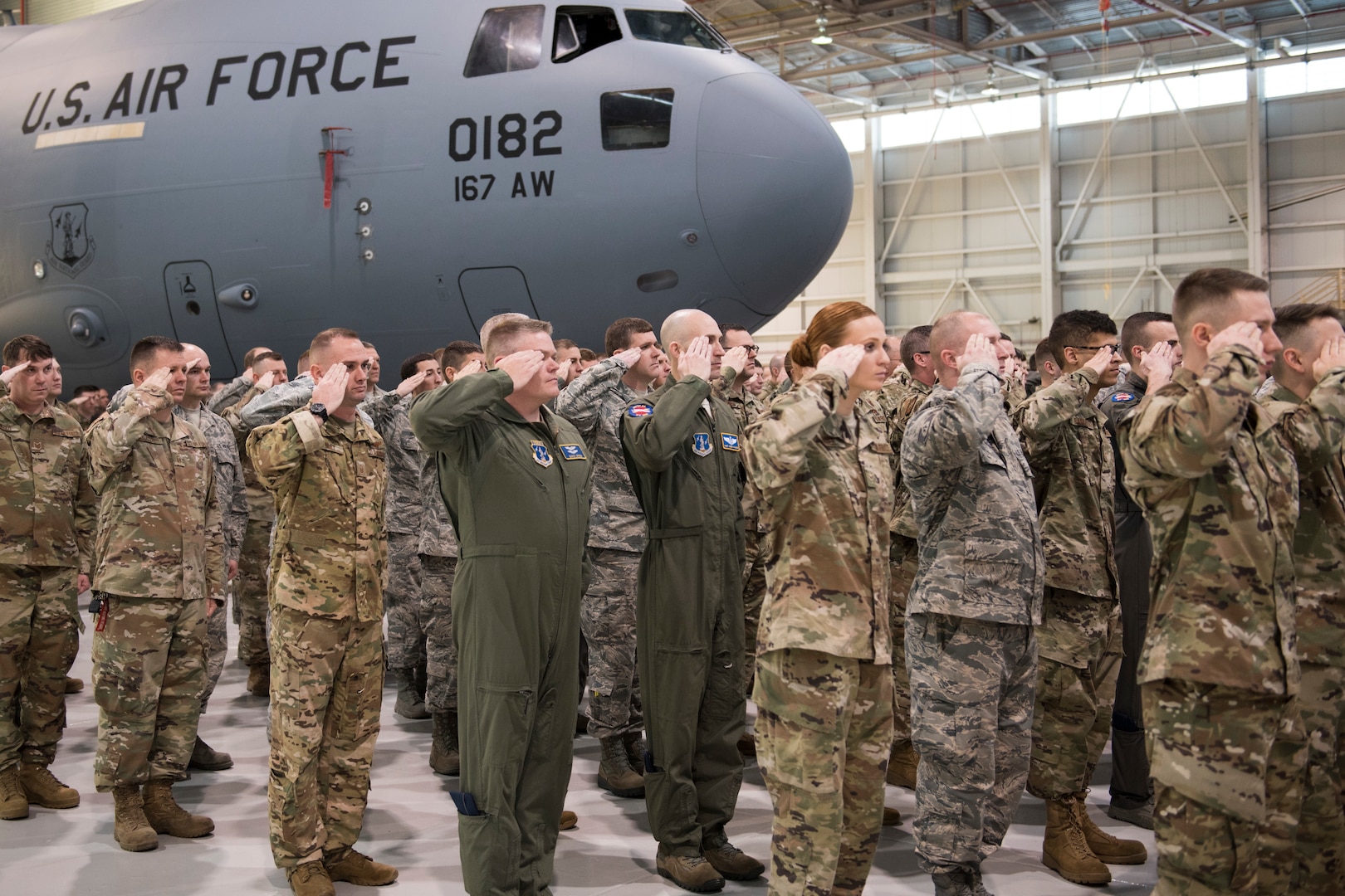 167th Airlift Wing Airmen salute their new commander during a change of command ceremony held in an aircraft hangar, Jan. 12, 2020. Col. Martin Timko assumed command of the wing, Col. David Cochran relinquished command during the ceremony.