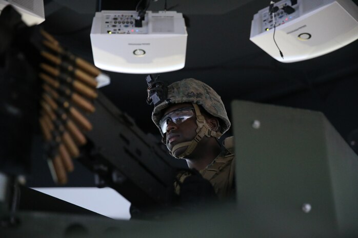U.S. Marine mans a Humvee turret during a combat convoy simulation on Marine Corps Base Camp Pendleton, California, Nov. 13.