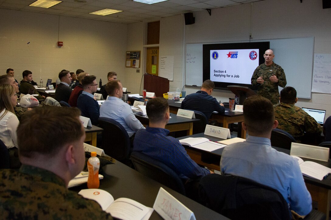 U.S. Marine Corps Sgt. Maj. Troy E. Black, right, Sergeant Major of the Marine Corps, addresses Marines attending a Transition Readiness Seminar on Marine Corps Air Station New River during a visit to MCAS New River, North Carolina, Jan. 08, 2020. Black visited for familiarization with the current posture of Installation services, health and welfare of the service members, government employees and families within privatized military housing. (U.S. Marine Corps photo by Cpl. Dominique Osthoff)