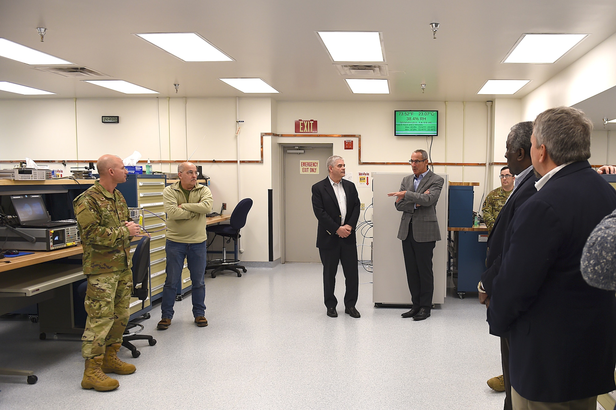Col. Eliot Sasson, 62nd Maintenance Group commander, far left, speaks with members of the National Commission on Military Aviation Safety (NCMAS) inside the precision equipment measurement lab on Joint Base Lewis-McChord (JBLM), Wash., Jan. 7, 2020. While at JBLM, the NCMAS participated in discussion forums with base leadership, as well as junior enlisted from both McChord’s maintenance and operations units, to better understand their daily challenges and how to improve aviation safety and readiness.