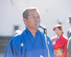 Yoichi Akimoto, president of the Japanese Welfare Association, gives opening remarks during the JWA New Year Fest, Jan.10, 2020, at Yokota Air Base, Japan.