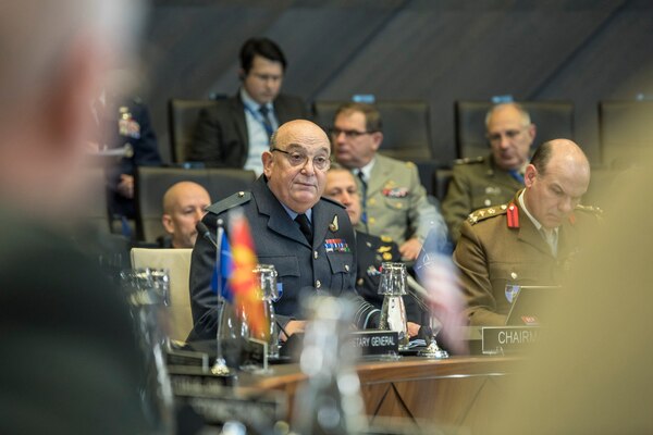 British military officer addresses group.