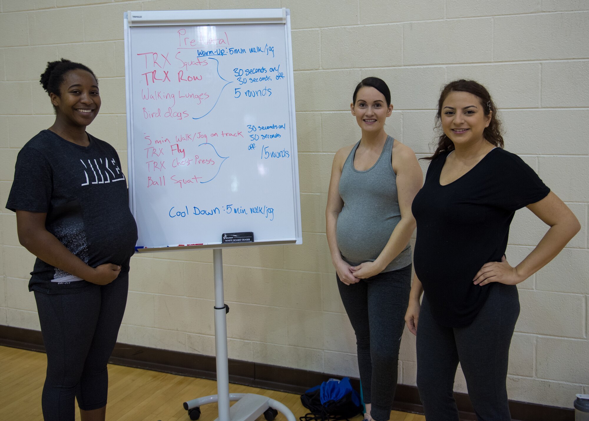 Participants in the prenatal fitness class pose for a photo at Joint Base Langley-Eustis, Virginia, Jan. 13, 2020.