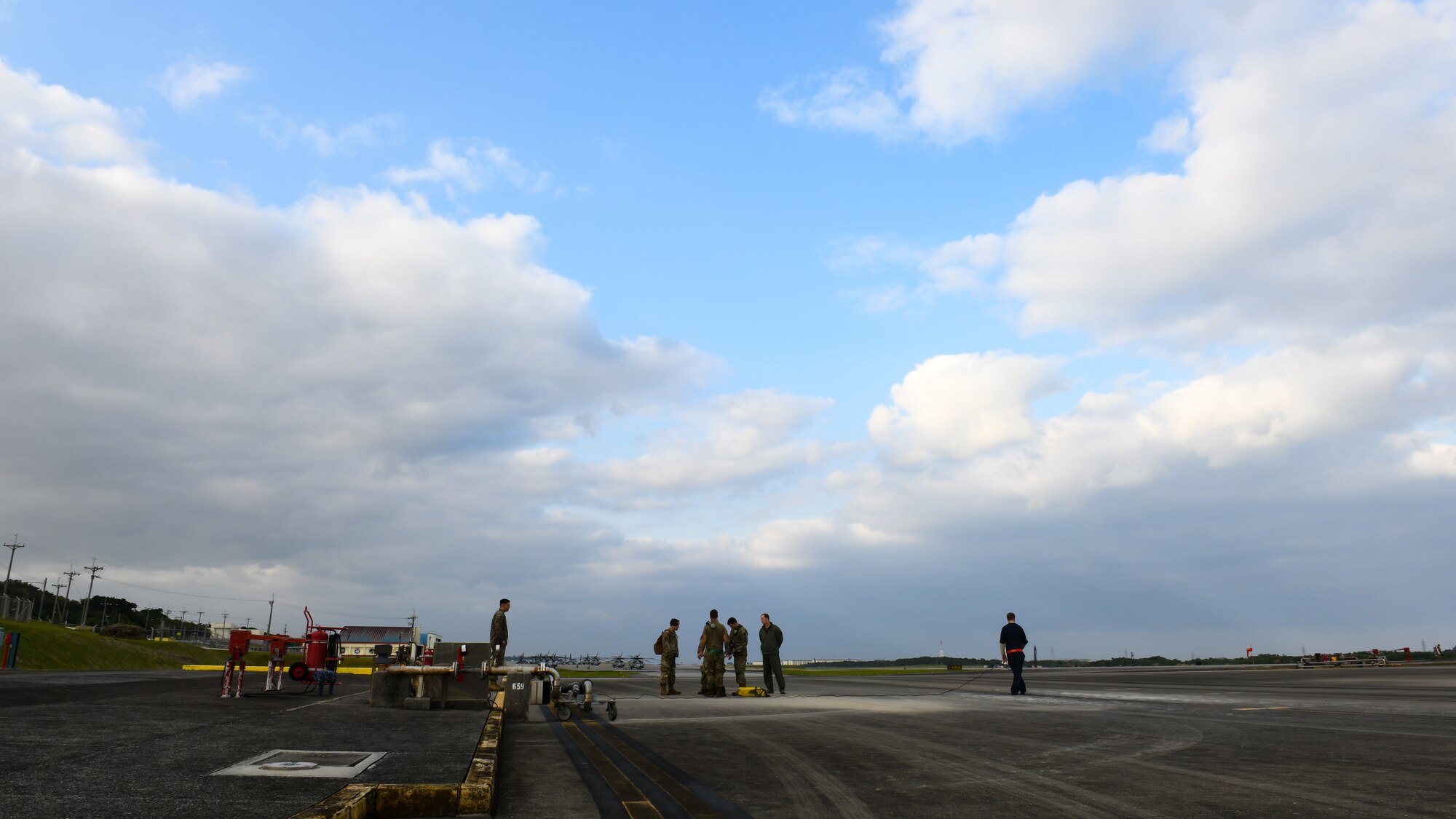 Maintainers from the 18th Aircraft Maintenance Squadron, 67th Aircraft Maintenance Unit prepare to refuel F-15C Eagles during Exercise Rumrunner at Marine Corps Air Station Futenma, Japan, Jan. 10, 2020. The 18th Wing and its joint partners executed the first WestPac Rumrunner exercise, which focused on defensive counter air capabilities and joint interoperability using agile combat employment concepts. (U.S. Air Force photo by Staff Sgt. Benjamin Raughton)
