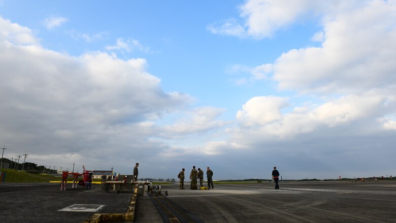 Maintainers from the 18th Aircraft Maintenance Squadron, 67th Aircraft Maintenance Unit prepare to refuel F-15C Eagles during Exercise Rumrunner at Marine Corps Air Station Futenma, Japan, Jan. 10, 2020. The 18th Wing and its joint partners executed the first WestPac Rumrunner exercise, which focused on defensive counter air capabilities and joint interoperability using agile combat employment concepts. (U.S. Air Force photo by Staff Sgt. Benjamin Raughton)