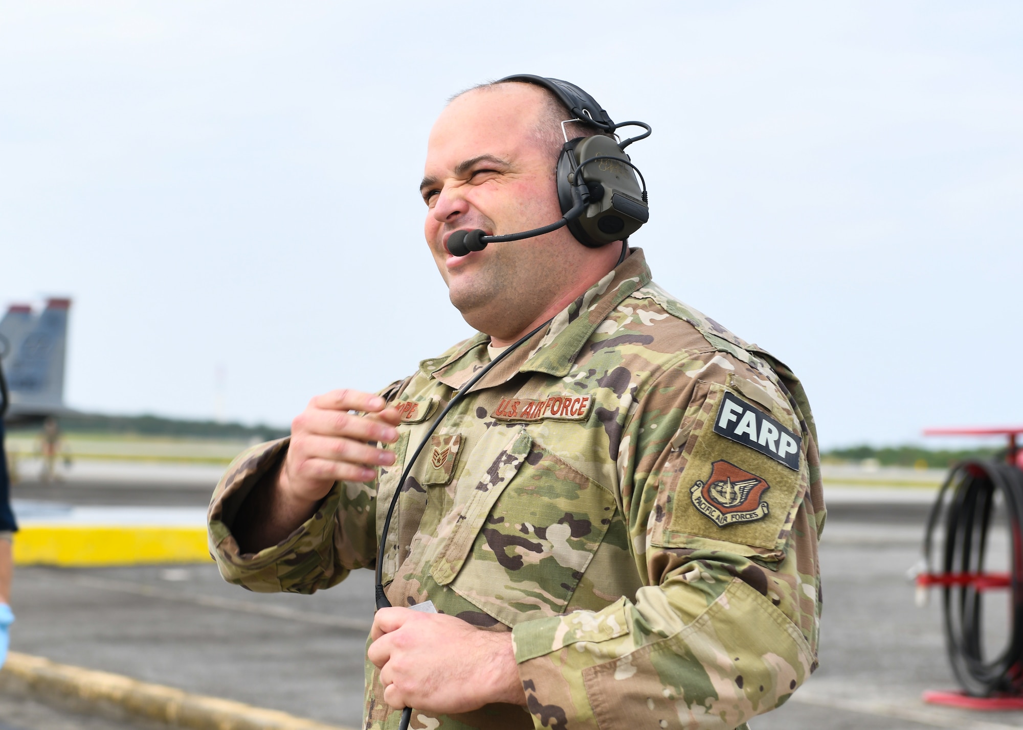 U.S. Air Force Staff. Sgt. Adam Kope, 18th Aircraft Maintenance Squadron, 67th Aircraft Maintenance Unit F-15C Eagle dedicated crew chief, talks to the pilot of an F-15C during Exercise Rumrunner at Marine Corps Air Station Futenma, Japan, Jan. 10, 2020. The 18th Wing and its joint partners executed the first WestPac Rumrunner exercise, which focused on defensive counter air capabilities and joint interoperability using agile combat employment concepts. (U.S. Air Force photo by Staff Sgt. Benjamin Raughton)