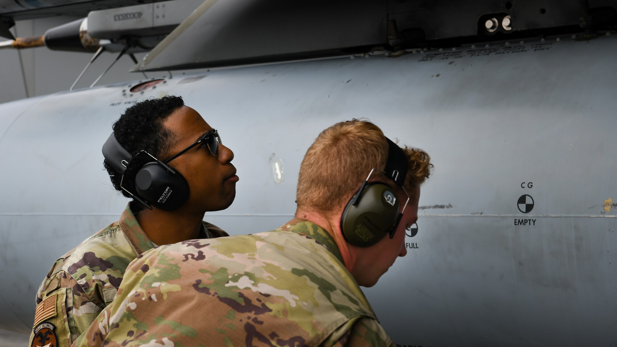 Maintainers from the 18th Aircraft Maintenance Squadron inspect an F-15C Eagle during Exercise WestPac Rumrunner at Marine Corps Air Station Futenma, Japan, Jan. 10, 2020. The 18th Wing and its joint partners executed the first WestPac Rumrunner exercise, which focused on defensive counter air capabilities and joint interoperability using agile combat employment concepts. (U.S. Air Force photos by Staff Sgt. Benjamin Raughton)