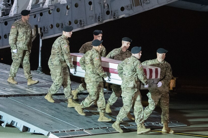 A U.S. Army carry team transfers the remains of Pfc. Miguel A. Villalon, of Joliet, Ill, Jan. 14, 2020 at Dover Air Force Base, Del. Villalon was assigned to 307th Brigade Engineer Battalion, 3rd Brigade Combat Team, 82nd  Airborne Division, Fort Bragg, N.C. (U.S. Air Force Photo by Mauricio Campino)