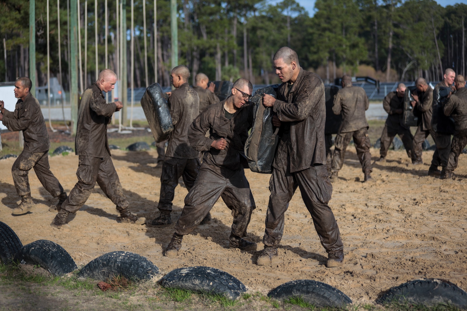 Recruits with Hotel Company, 2nd Recruit Training Battalion, participate in a Crucible event at Marine Corps Recruit Depot Parris Island, South Carolina, Jan. 10, 2020. The Crucible is a 54-hour field training exercise that presents continuous physical and mental challenges. (U.S. Marine Corps photo by Lance Cpl. Christopher McMurry)
