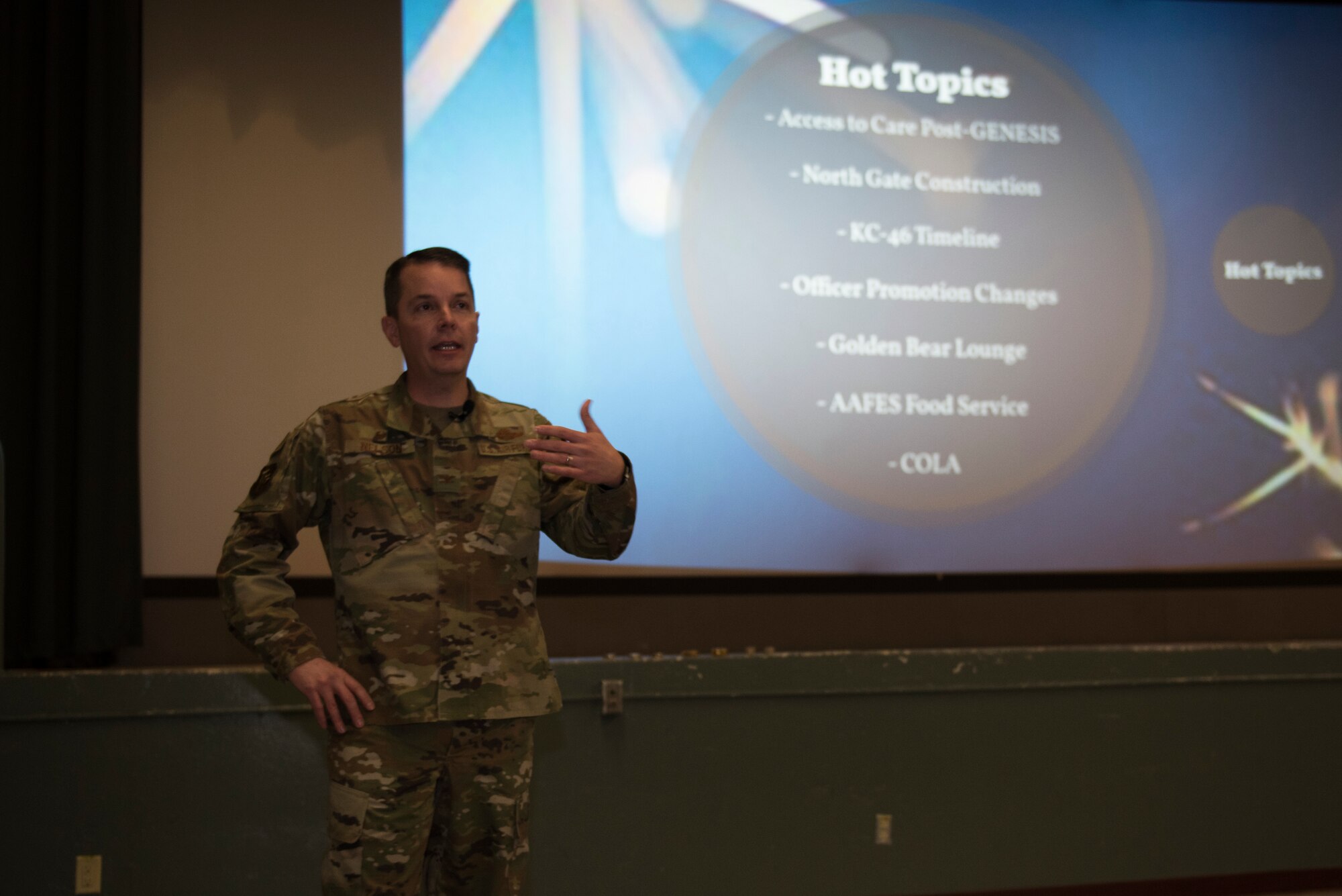 U.S. Air Force Col. Jeff Nelson, 60th Air Mobility Wing commander, speaks to Airmen during a commander’s call Jan. 7, 2020, at Travis Air Force Base, California.  Nelson and Chief Master Sgt. Derek Crowder, 60th AMW command chief, spoke to Airmen about Club Hub, Airmen Against Drunk Driving and other topics. (U.S. Air Force photo by Airman 1st Class Cameron Otte)