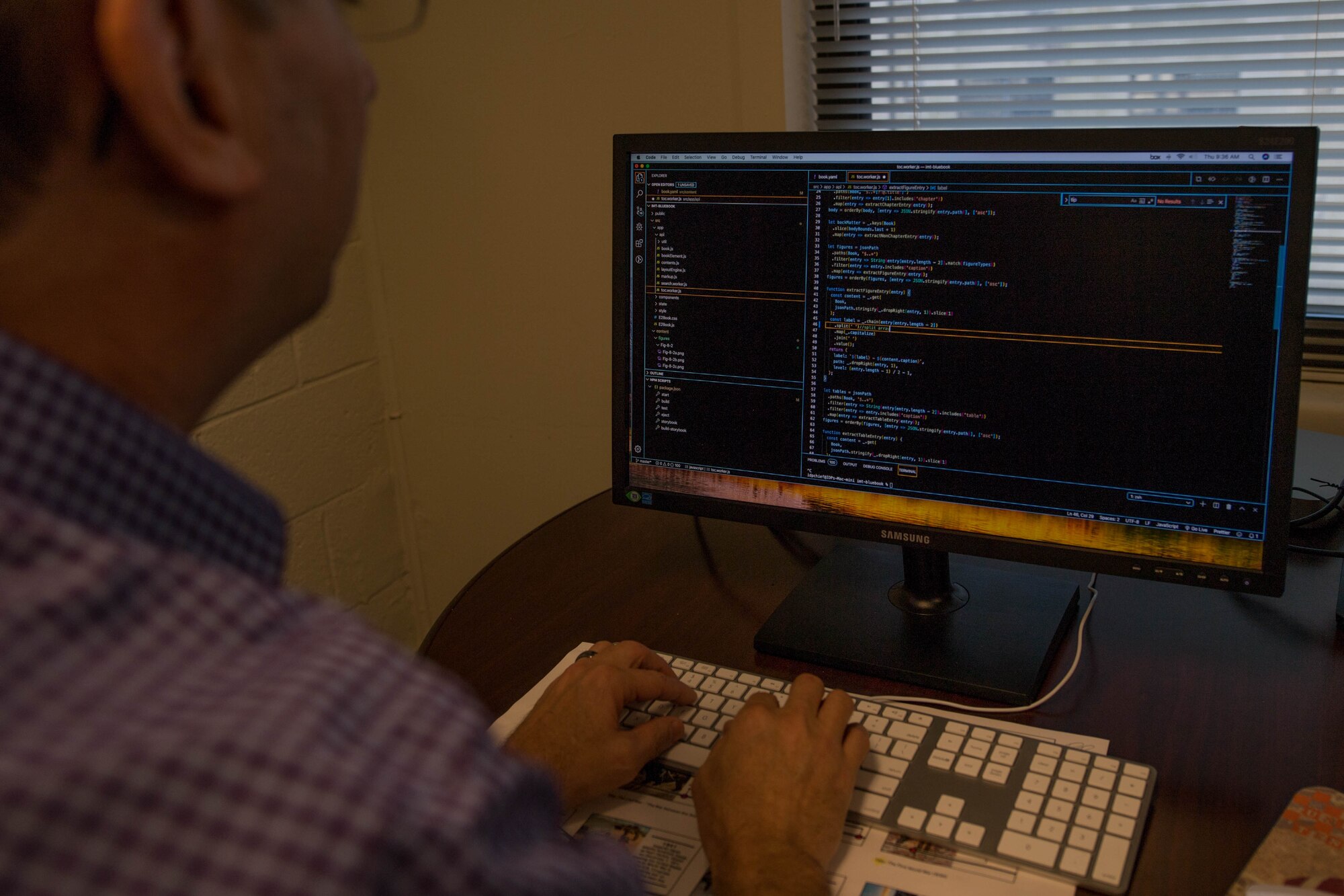 An employee at the Mobile Division, Army Distributed Learning Program, Army University writes code for a mobile application at Joint Base Langley-Eustis, Virginia, Jan. 9, 2020. The mobile division is responsible for developing, vetting and fixing Department of Defense and Department of the Army apps. (U.S. Air Force photo by Senior Airman Derek Seifert)