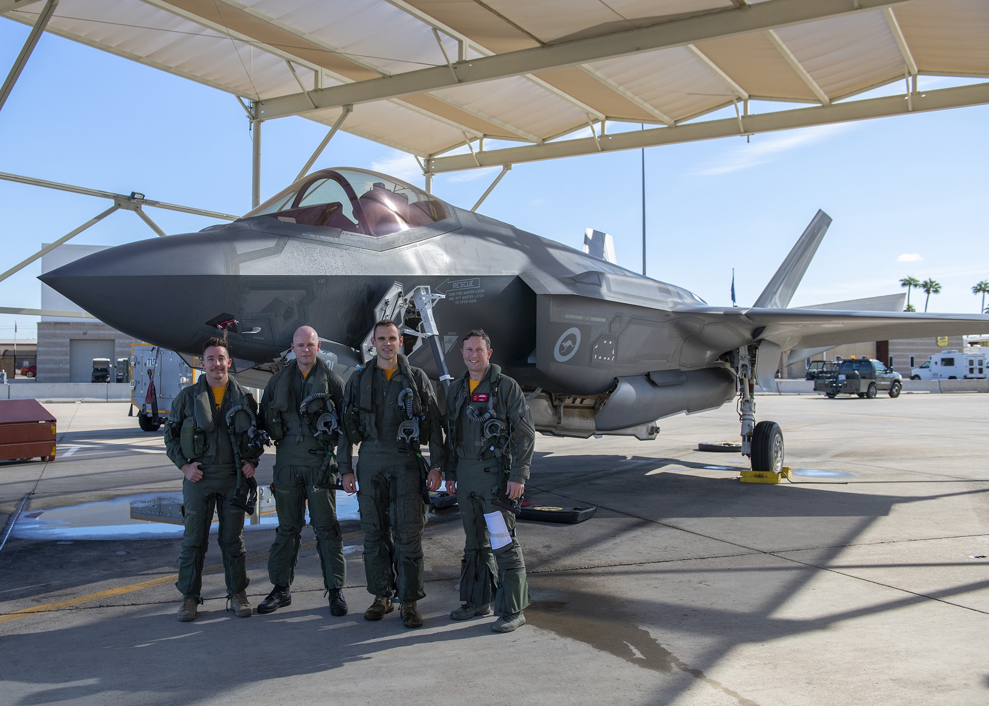 Royal Australian air force pilots pose following their final training flight at Luke Air Force Base Nov. 22, 2019, at Luke AFB, Ariz.