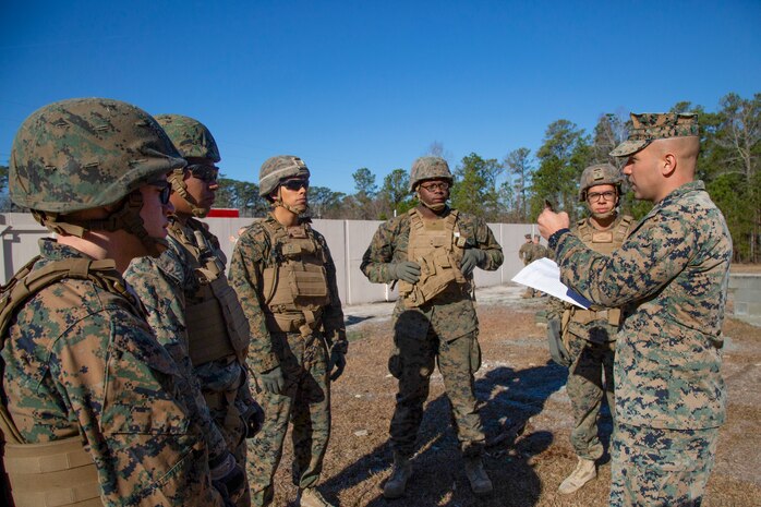 U.S. Marine mentors Marines with 2nd AA Bn, 2nd Marine Division, at the new Leadership Reaction Course on Marine Corps Base Camp Lejeune, North Carolina, Jan. 7.