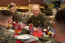 U.S. Marines stationed at Marine Corps Air Station New River have lunch with Sgt. Maj. Troy E. Black, center, the 19th sergeant major of the Marine Corps, during a visit to MCAS New River, North Carolina, Jan. 8, 2020.
