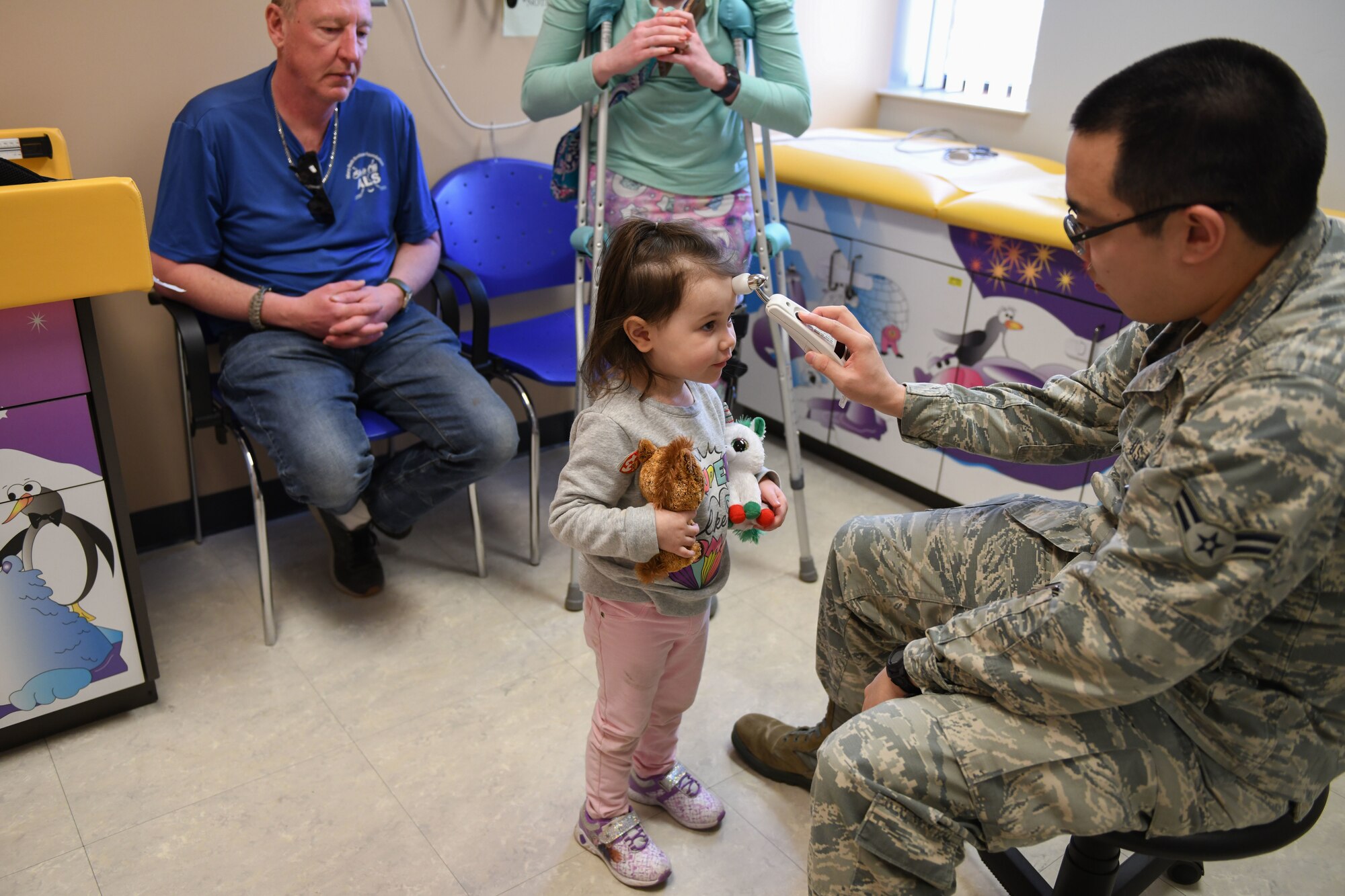a man helps a child
