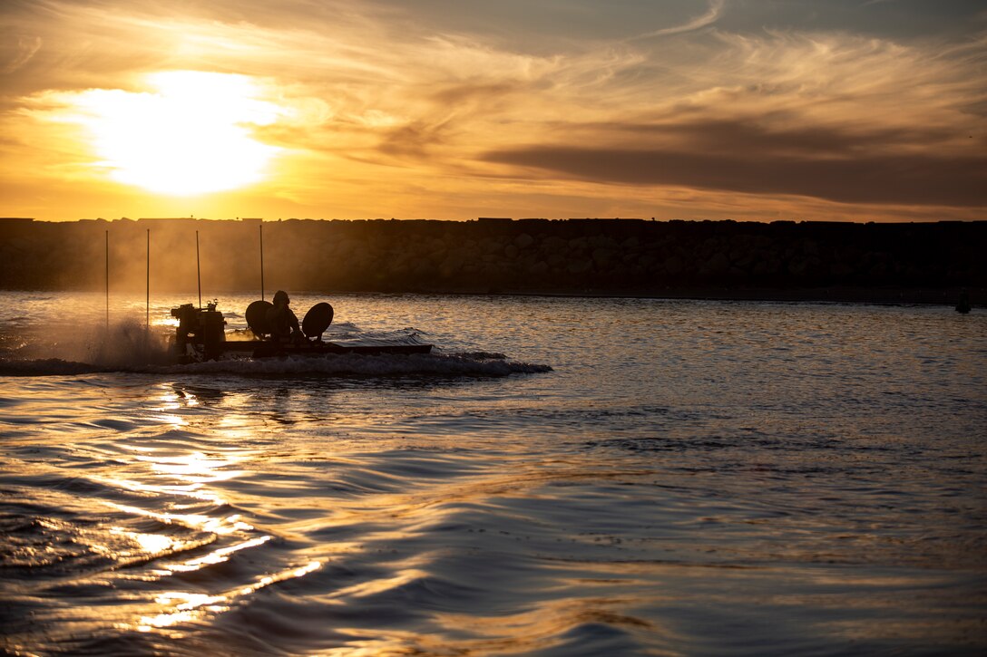 U.S. Marines with Amphibious Vehicle Test Branch, Marine Corps Tactical Systems Support Activity, test Amphibious Combat Vehicles along the beach during low-light surf transit testing at AVTB Beach on Marine Corps Base Camp Pendleton, California, Dec. 16, 2019.