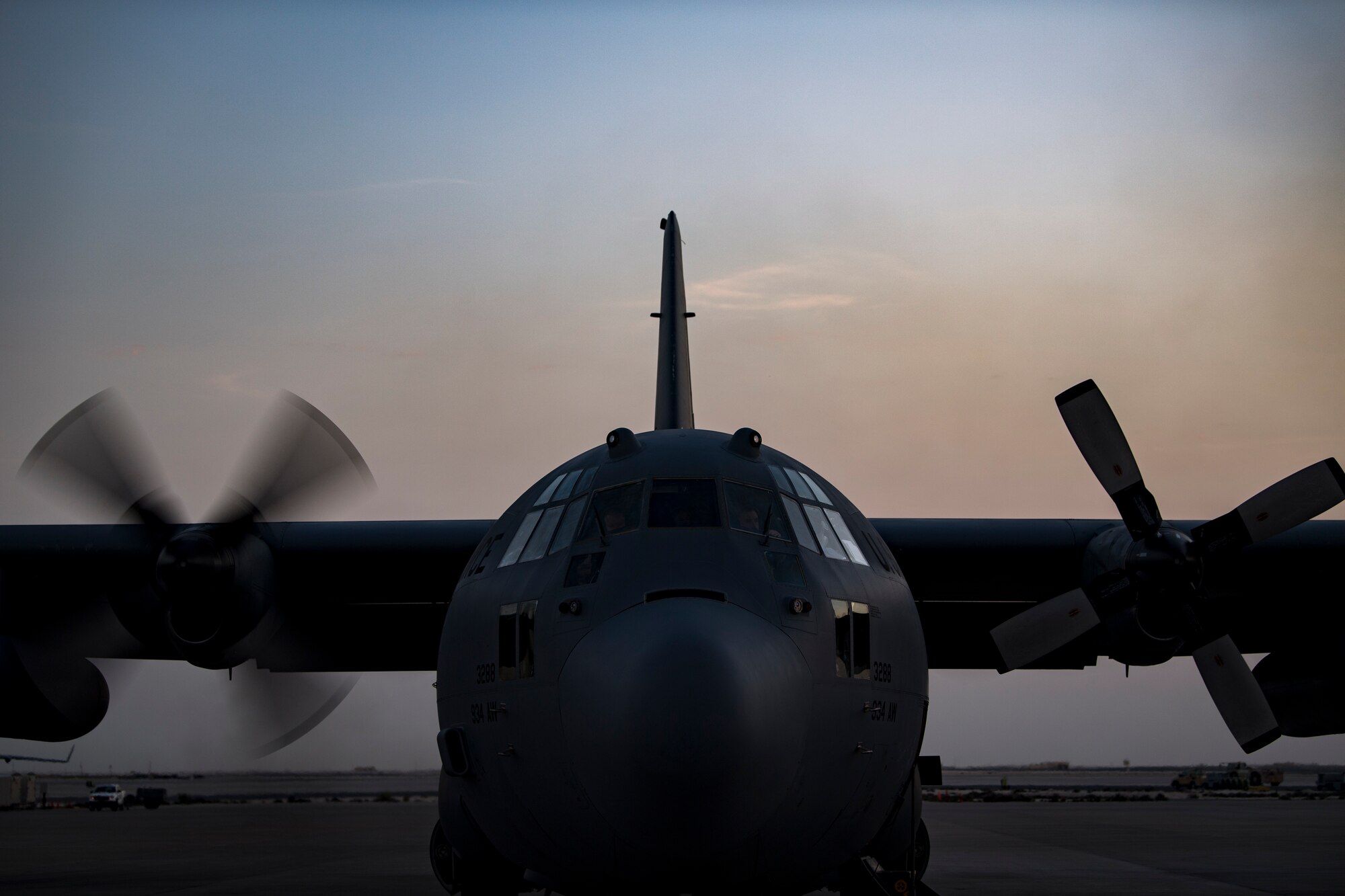 U.S. Air Force aircrew members assigned to the 746th Expeditionary Airlift Squadron conduct preflight checks of a C-130 Hercules in the U.S. Central Command area of responsibility, Jan. 8, 2020