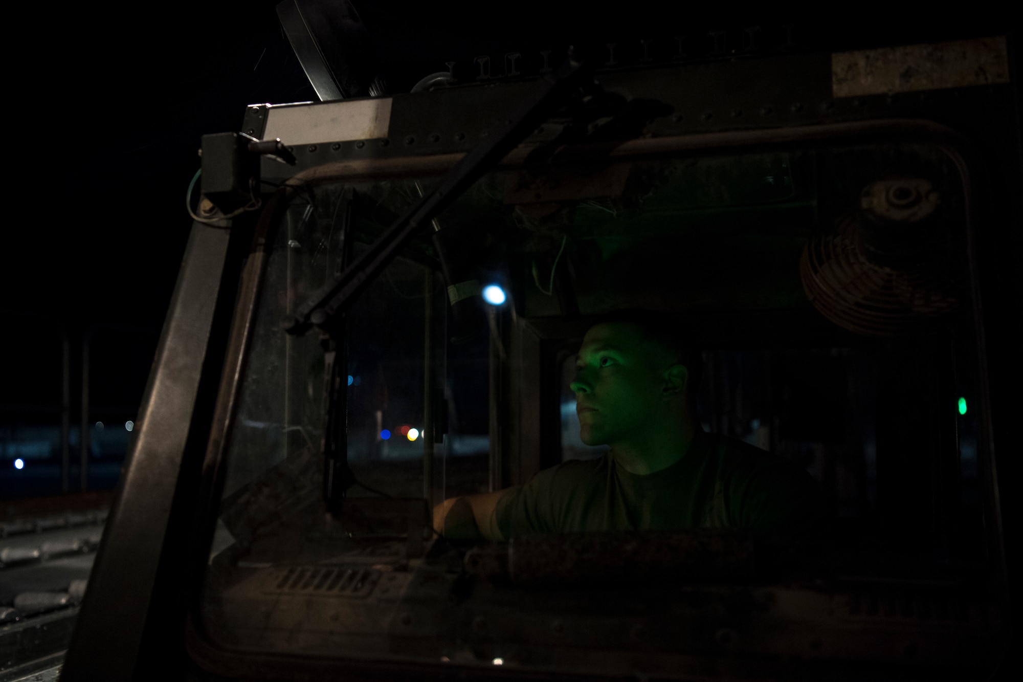 A U.S. Air Force aerial porter assigned to U.S. Air Forces Central Command loads cargo into a C-130 Hercules with the 746th Expeditionary Airlift Squadron in the U.S. Central Command area of responsibility, Jan. 8, 2020.