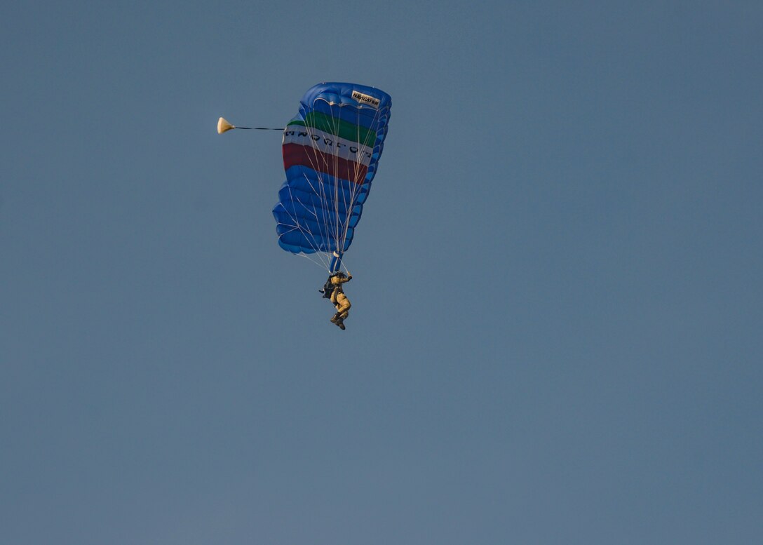 An Italian air force airman parachutes onto the airfield with the 57th Rescue Squadron at Aviano Air Base, Italy, Jan. 15, 2020. The 57th RQS provides personnel recovery, combat search and rescue, civil search and rescue and casualty evacuation subject matter experts to fulfill USEUCOM, USAFRICOM and NATO security cooperation requirements. (U.S. Air Force photo by Airman Thomas S. Keisler IV)