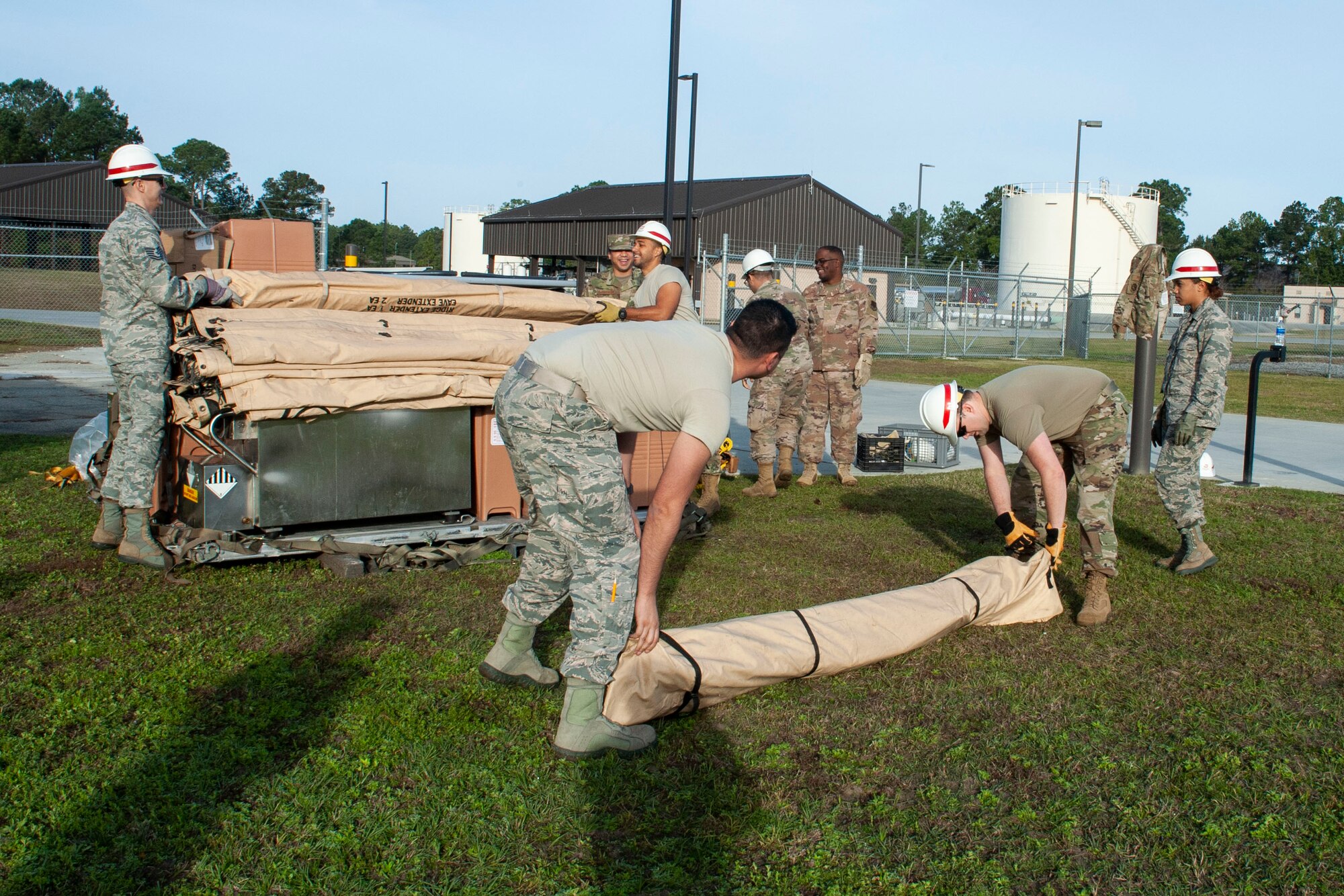 Photo of Airmen setting up a Temper Tent