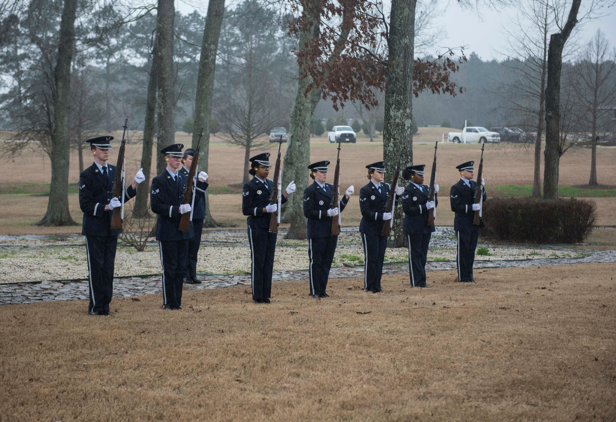 Seven Columbus Air Force Base Honor Guardsmen act as the firing party at the Mississippi Veterans Memorial Cemetery on Jan. 13, 2020, in Newton County, Miss. McNichols was a member of the 855th Aircraft Maintenance Squadron at Nellis Air Force Base, Nev., prior to his death. The seven-man team fires their three rounds in perfect unison, honoring the fallen. (U.S. Air Force Base photo by Airman Davis Donaldson)