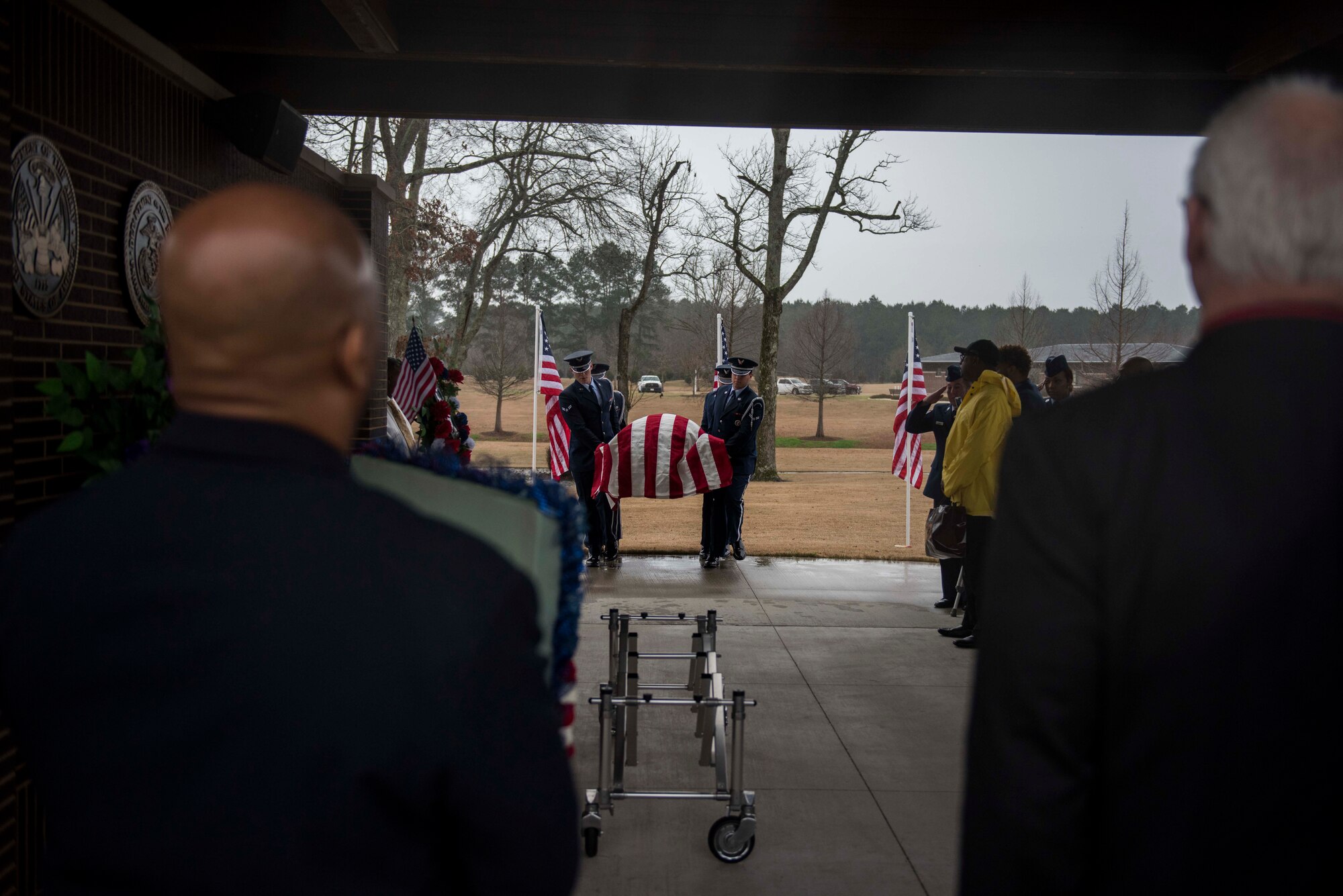 Columbus Air Force Base Honor Guardsmen carry the casket of Staff Sgt. Tharin McNichols at the Mississippi Veterans Memorial Cemetery on Jan. 13, 2020, in Newton County, Miss. McNichols was a member of the 855th Aircraft Maintenance Squadron at Nellis Air Force Base, Nev., prior to his death. Guardsmen carry the fallen to the gravesite while keeping the casket perfectly level and maintaining the utmost military bearing. (U.S. Air Force photo by Airman Davis Donaldson)