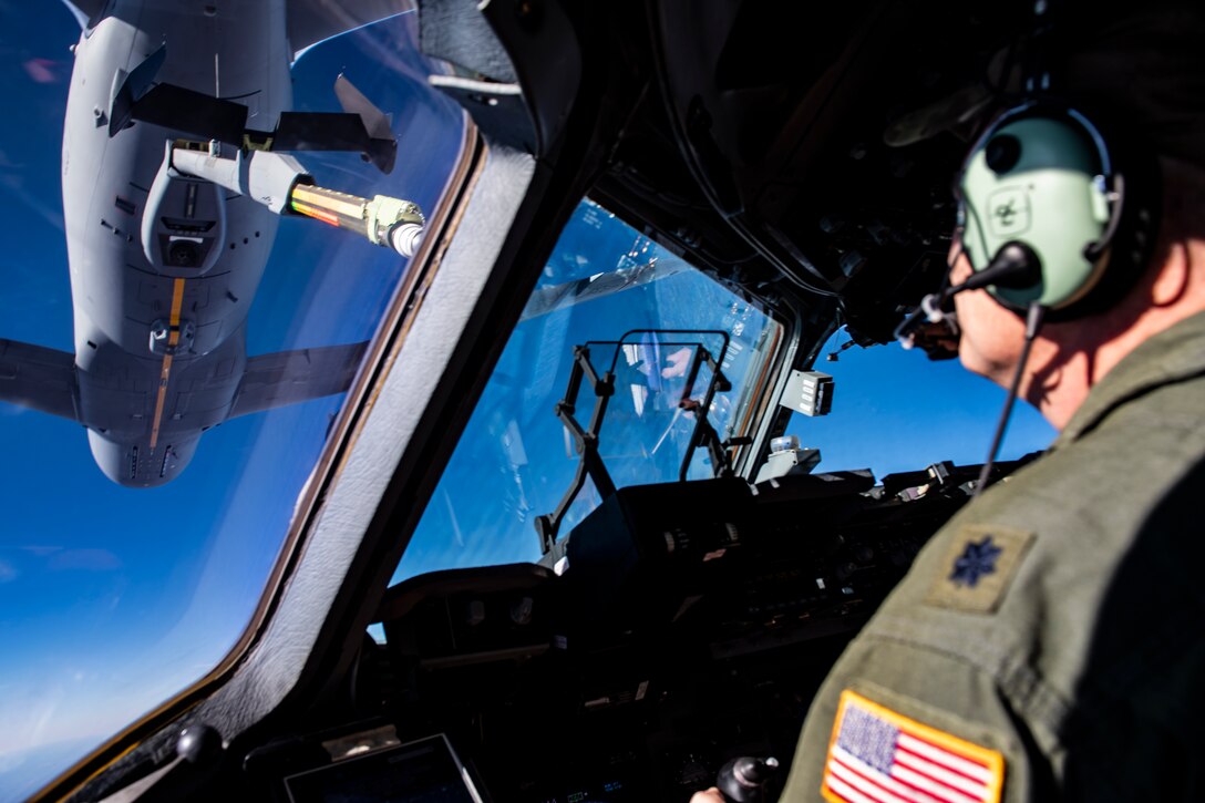 A KC-46 Pegasus assigned to the 22nd Air Refueling Wing flies away after a refueling training mission over Kansas, Jan. 6, 2020. The training mission not only allowed pilots from the 911th Airlift Wing to train, but also pilots and boom operators from the 22nd ARW to receive training as well.