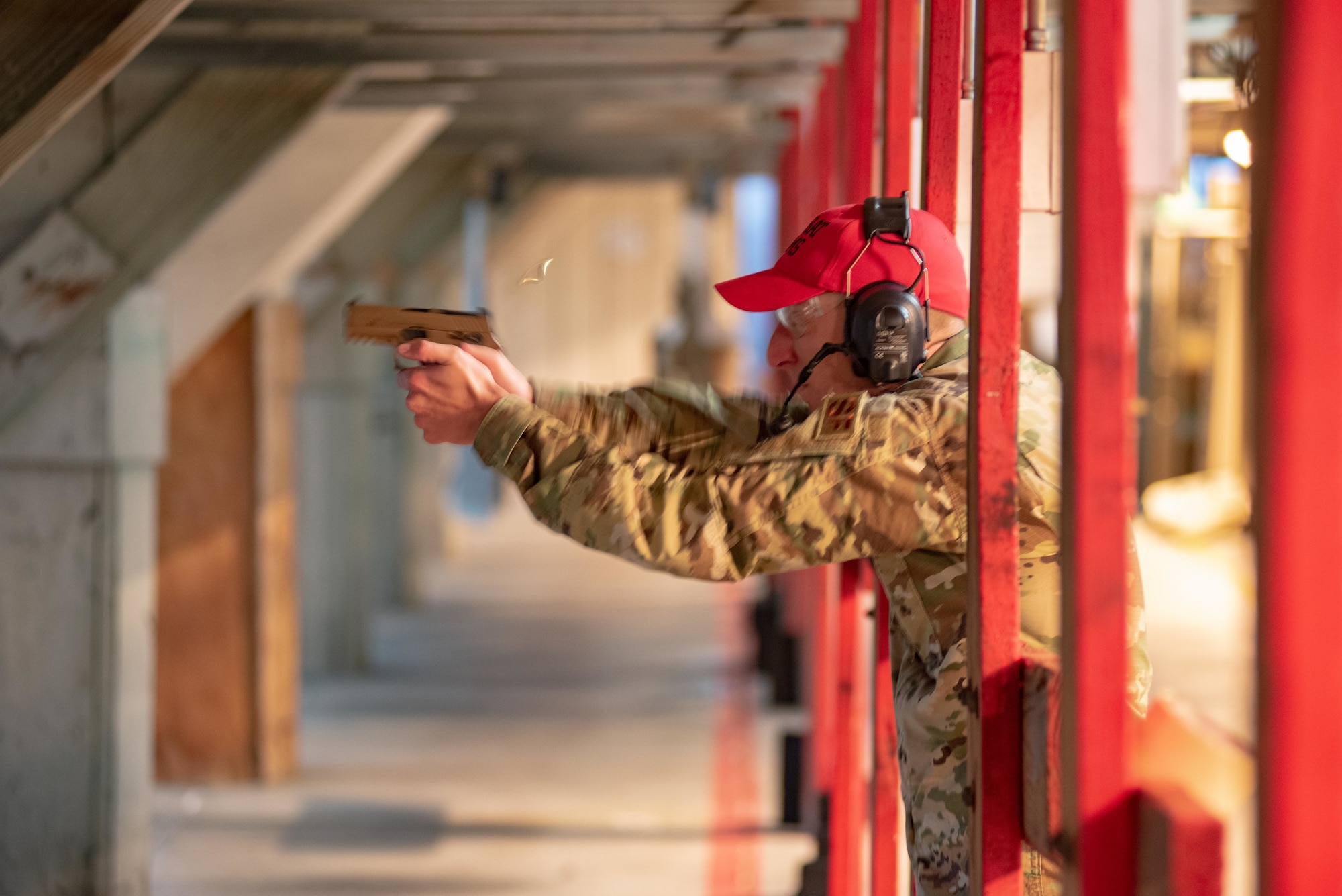 Tech. Sgt. Matt Leake, 22nd Security Forces Squadron combat arms training and maintenance instructor, fires an M18 pistol Jan. 10, 2019, at McConnell Air Force Base, Kansas. Leake must be proficient on the base’s inventory of firearms to teach others about the weapon. (U.S. Air Force photo by Staff Sgt. Chris Thornbury)