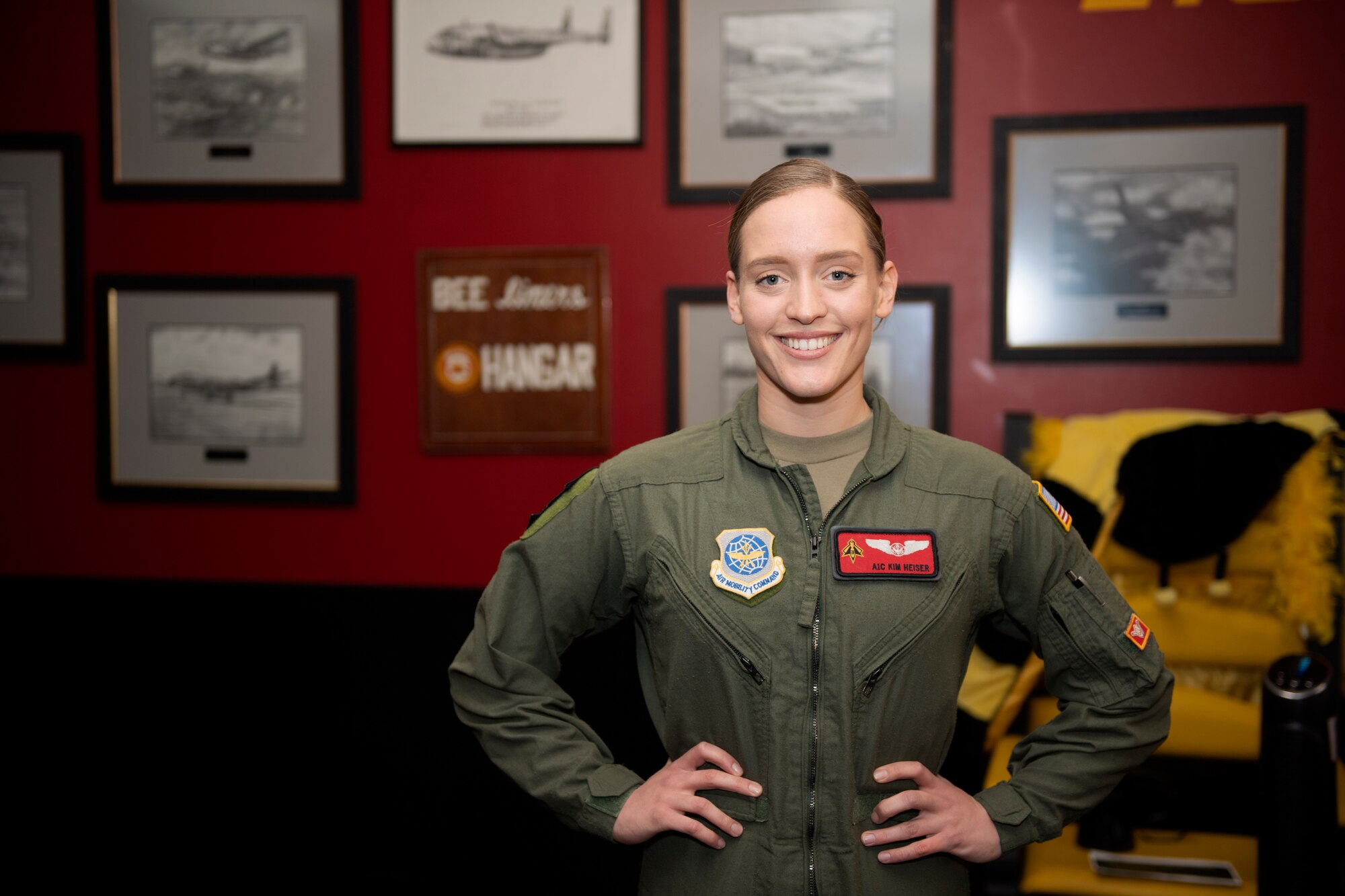 U.S. Air Force Airman 1st Class Kimberly Heiser, 21st Airlift Squadron loadmaster, stands in the squadron’s heritage room Jan. 9, 2020, at Travis Air Force Base, California. Heiser was the 60th Air Mobility Wing’s Warrior of the Week, a program that recognizes Airmen who have made significant contributions to their unit. (U.S. Air Force photo by Senior Airman Jonathon Carnell)