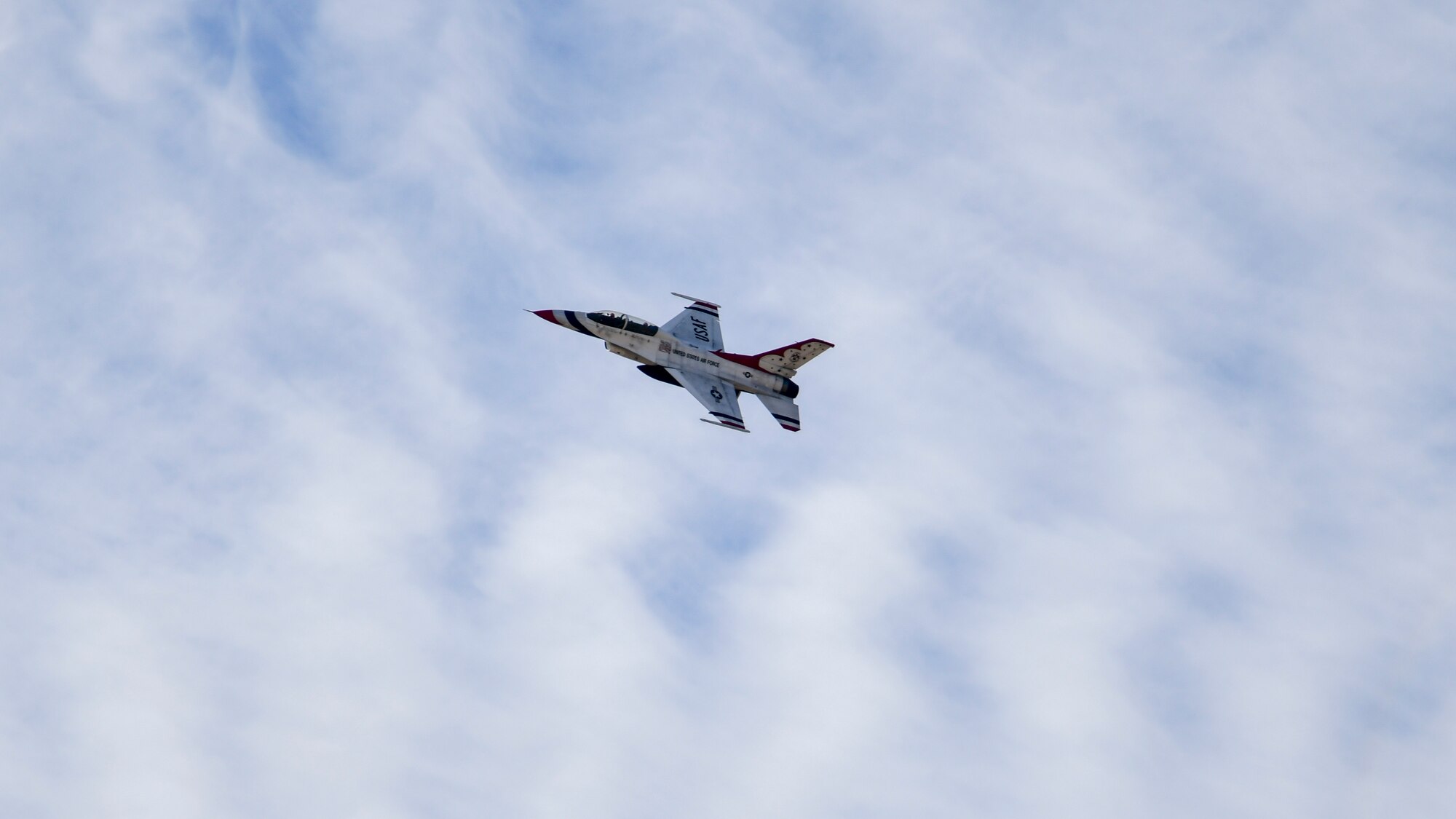 Air Force Thunderbird jet #8, flown by Maj. Jason Markzon, flies over Edwards Air Force Base, California, Jan. 16. Markzon, the advance pilot and narrator for the Thunderbirds Flight Demonstration Squadron, visited different base facilities at Edwards to conduct a site survey ahead of their performance at the 2020 Aerospace Valley Air Show, Oct. 10-11. (Air Force photo by Giancarlo Casem)