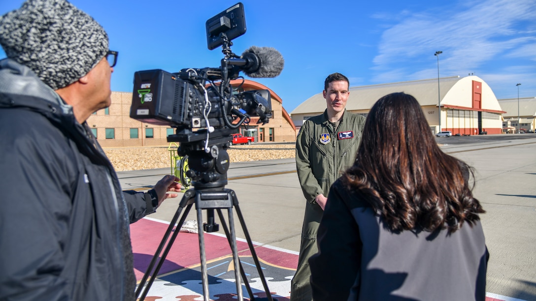 Maj. Thomas Stuart, 412th Test Wing and Aerospace Valley Air Show Director, talks to local news media reporters at Edwards Air Force Base, California, Jan. 16. Air show officials hosted a Thunderbirds Flight Demonstration Squadron advance pilot to conduct a site survey prior to their performance at the air show Oct. 10-11. (Air Force photo by Giancarlo Casem)