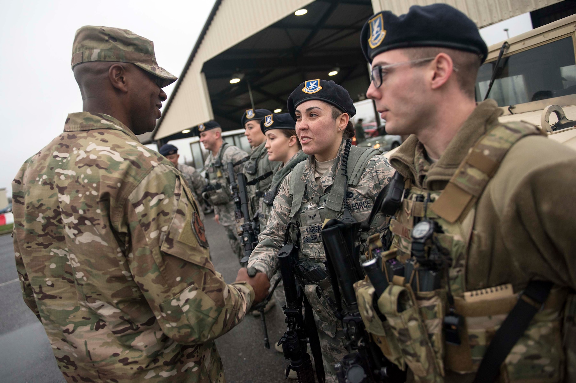 U.S. Air Force Chief Master Sgt. of the Air Force Kaleth O. Wright shakes hands with a 100th Security Forces Squadron Airman during a visit at RAF Mildenhall, England, Dec. 26, 2018. Both Wright and Air Force Chief of Staff Gen. David L. Goldfein visited Team Mildenhall prior to heading back to the U.S. after a visit to U.S. Central Command during the holidays. (U.S. Air Force photo by Staff Sgt. Christine Groening)