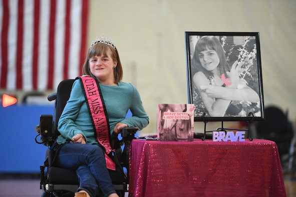 Brianna Heim, daughter of Wendy and Master Sgt. Scott Heim, 388th Maintenance Squadron, talks about her book, 'Brave Betty & Her Besties', at a base event Oct. 9, 2019, at Hill Air Force Base, Utah. Brianna was invited to write a book by Dallas Graham, founder of The Red Fred Project, which finds children living with extraordinary circumstances and asks them the question: If you could write a book for the entire world to read, what would it be about? (U.S. Air Force photo by Cynthia Griggs)