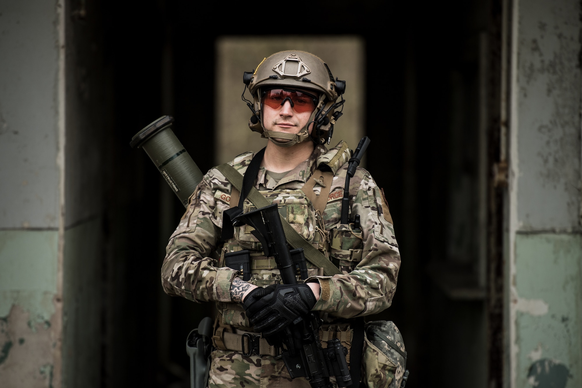 U.S. Air Force Staff Sgt. Estaban Gonawicha, 435th Security Forces Squadron ground combat readiness training center instructor, poses for a photo before exercise Frozen Defender in Grostenquin, France, Jan. 14, 2020. Frozen Defender tests the squadron’s capabilities in a contested environment under harsh conditions. Gonawicha was equipped with an AT4, an 84-mm unguided anti-tank weapon, which could be used to disable armored vehicles. (U.S. Air Force photo by Staff Sgt. Devin Boyer)