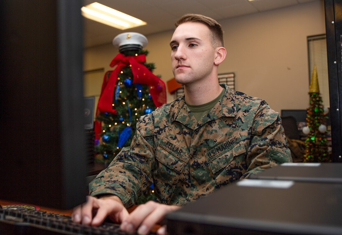 Cpl. Joseph Kellar, a data-systems administrator with Marine Wing Support Squadron 273, Marine Wing Support Group 27, 2nd Marine Aircraft Wing, poses for a photo at Marine Corps Air Station Beaufort, S.C., Dec. 16, 2019. “The only way to be a good leader is to lead yourself first," said Kellar a Ypsilanti, Mich., native. Kellar was praised by his command for moving 115 Marine Corps Enterprise Network computers in the absence of the data chief. He single-handedly re-imaged, de-issued, and replaced more than $266,000 of equipment for his command. (U.S. Marine Corps photo by Lance Cpl. Aidan Parker)