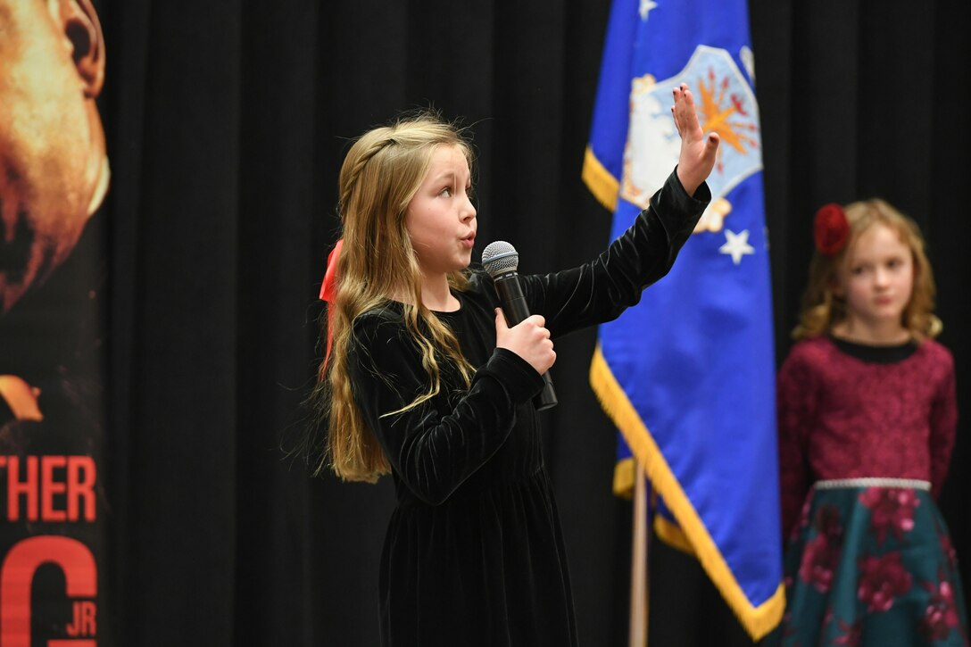 Poet Bigelow, 4th grader at Endeavour Elementary, delivers her speech during the Martin Luther King, Jr. Commemoration Luncheon Jan. 16, 2020, at Hill Air Force Base, Utah. Bigelow is a winner from the Davis County MLK Speech Competition where they chose to deliver a famous speech by Martin Luther King, Jr. (U.S. Air Force photo by Cynthia Griggs)