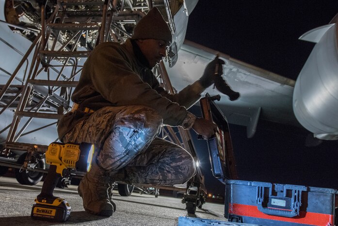 Senior Airman Markevis Duncan, 437th Aircraft Maintenance Squadron, aerospace propulsion specialist, packs up tools used to replace an electrical wire harness from a C-17 engine Jan. 7, 2020, at Joint Base Charleston, S.C.