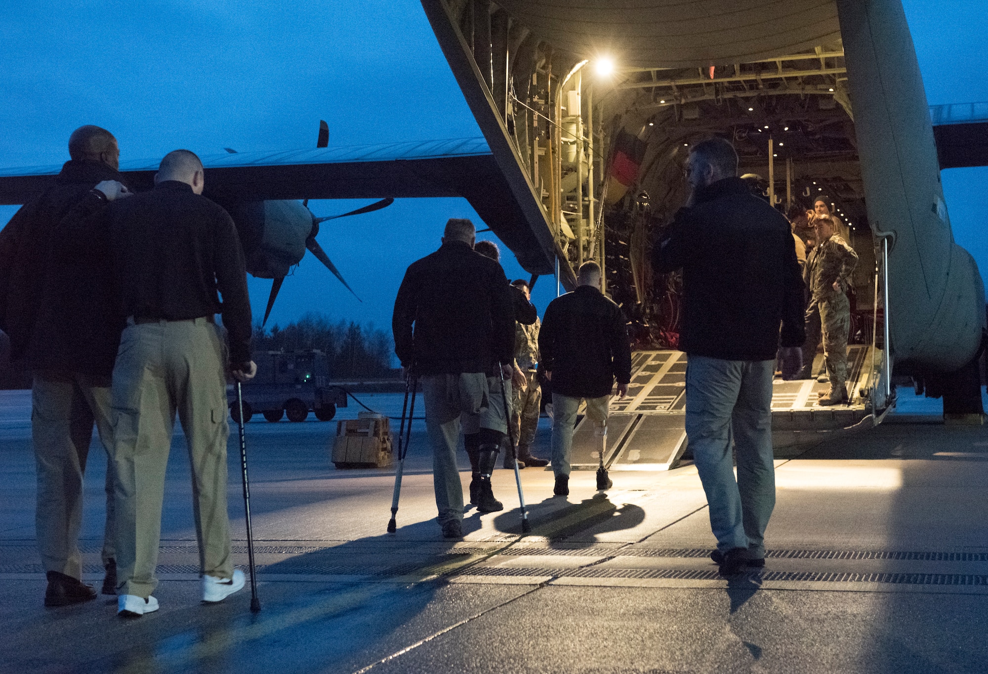 U.S. Army and U.S. Marine Corps wounded warriors with Operation Proper Exit board a C-130J Super Hercules aircraft at Ramstein Air Base, Germany, Jan. 13, 2020. OPE returns wounded warriors to the places they experienced combat injury and recovery as an opportunity to gain closure. The OPE mission states that these opportunities provide active duty service members the opportunity to see the commitment and resilience of U.S wounded warriors.