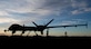 Airmen check over the first MQ-9 Reaper