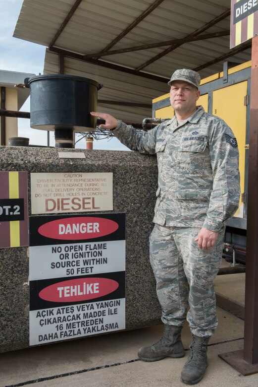 U.S. Air Force Tech. Sgt. Harry Thulstrup, 39th Civil Engineer Squadron water and fuels systems maintainer, points out how high the water rose during the flood on Christmas day Jan. 15, 2020, at Incirlik Air Base, Turkey. Though water reached five feet inside of the plant, the outside area was much deeper. (U.S. Air Force photo by Senior Airman Trevor Gordnier)