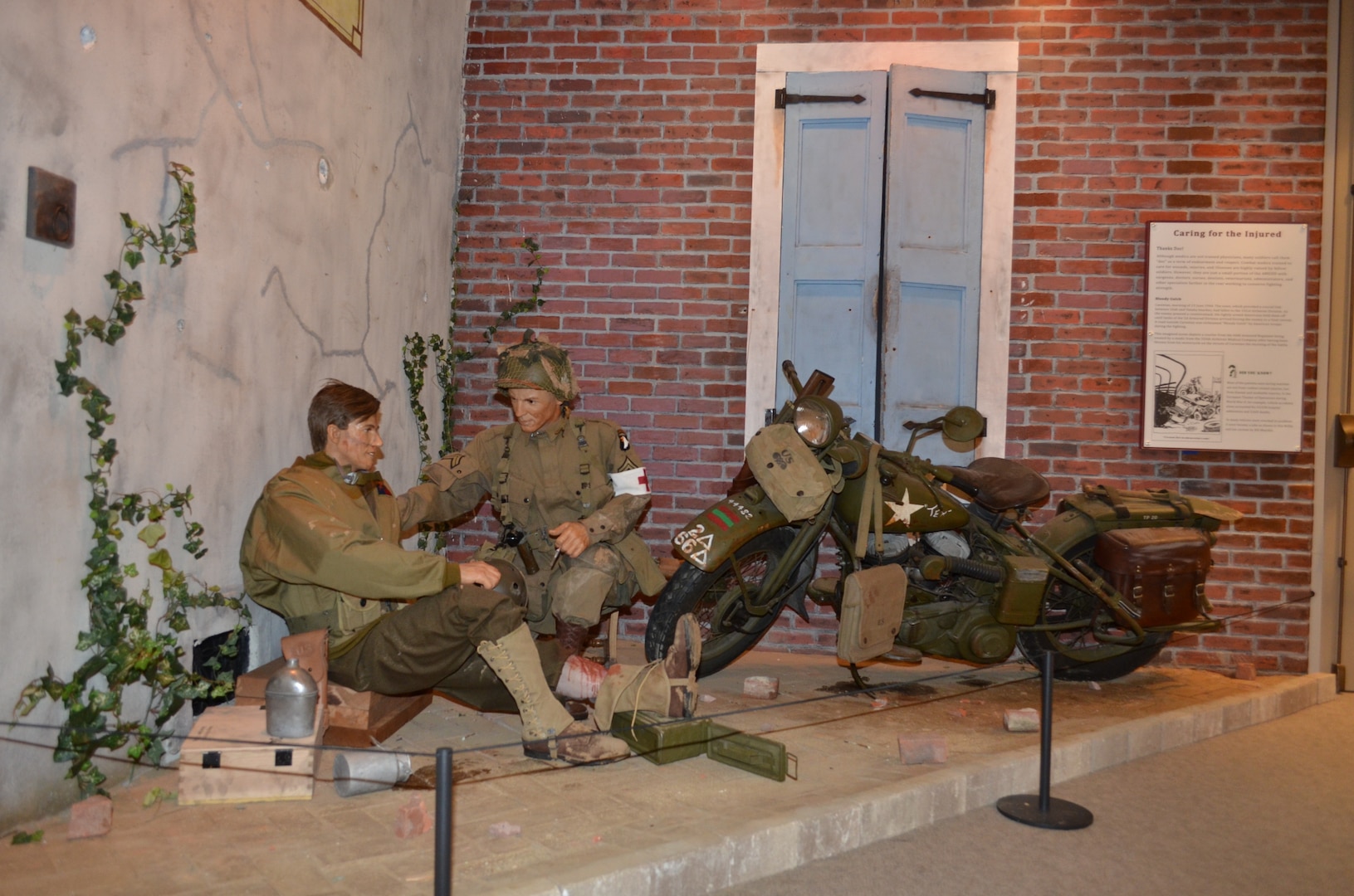 This scene depicting a medic treating a wounded dispatch rider in a French town after the D-Day invasion in 1944 is one of two new diorama displays at the U.S. Army Medical Department Museum at Joint Base San Antonio-Fort Sam Houston