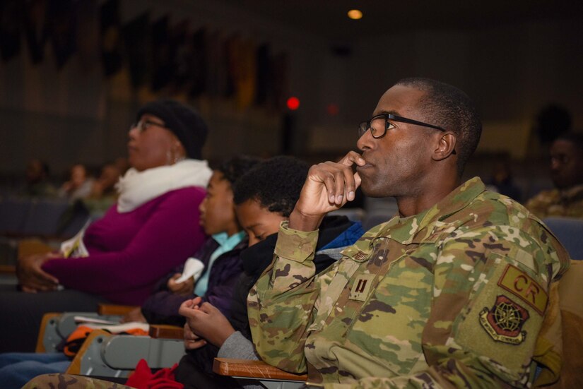 An Airman listens to a presentation.