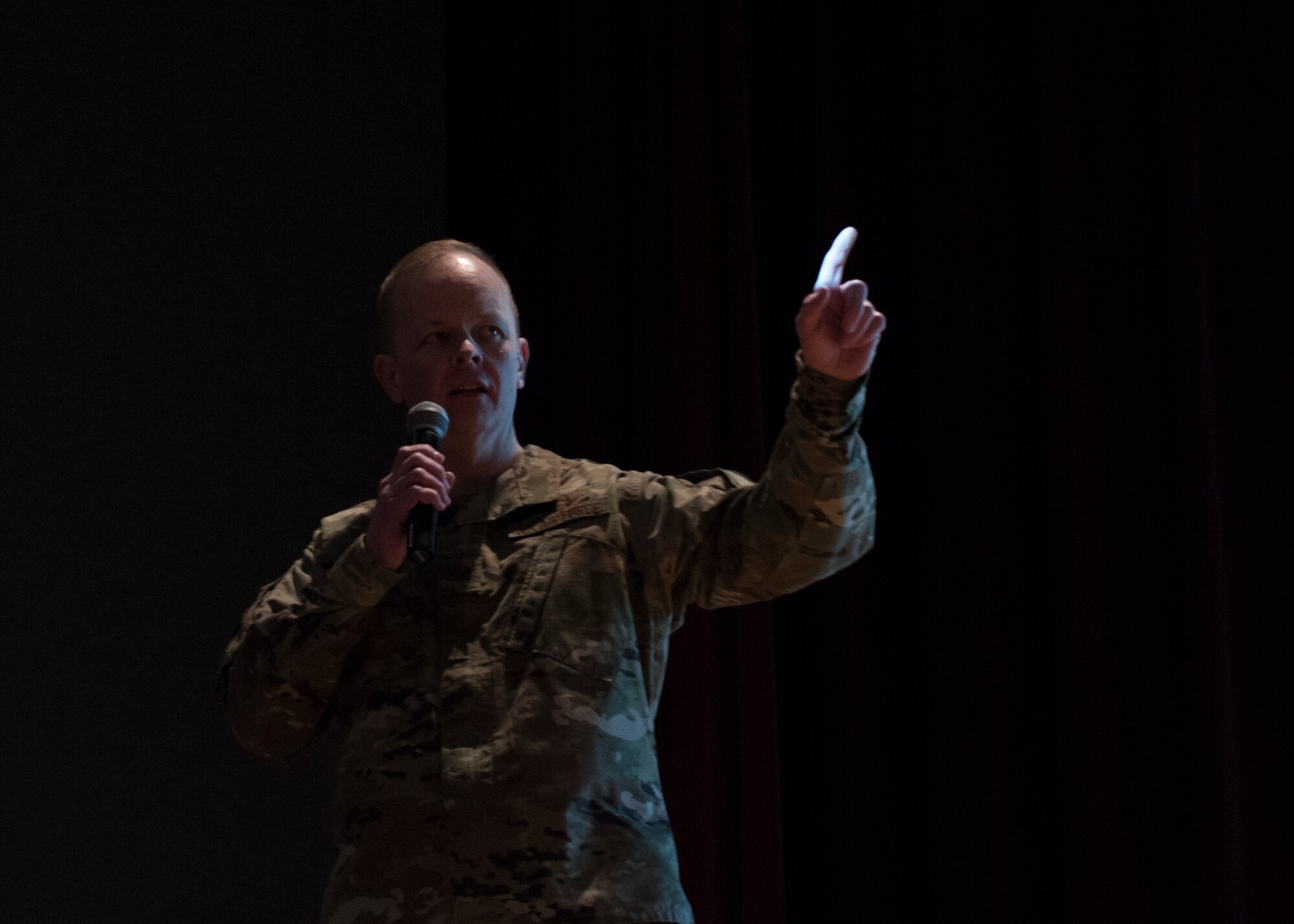 Col. Derek Salmi, 92nd Air Refueling Wing commander, points out details on a presentation during an all-call meeting at Fairchild Air Force Base, Washington, Jan. 15, 2020. Salmi highlighted the numerous accomplishments of Team Fairchild in 2019 to include: the reactivation of the 97th Air Refueling Squadron, Mobility Guardian Exercise, Inland Northwest Skyfest, Leaders Inspiring For Tomorrow, Spark Tank innovation competition, Year of the Defender and the Green In ’19 initiative. (U.S. Air Force photo by Staff Sgt. Ryan Lackey)