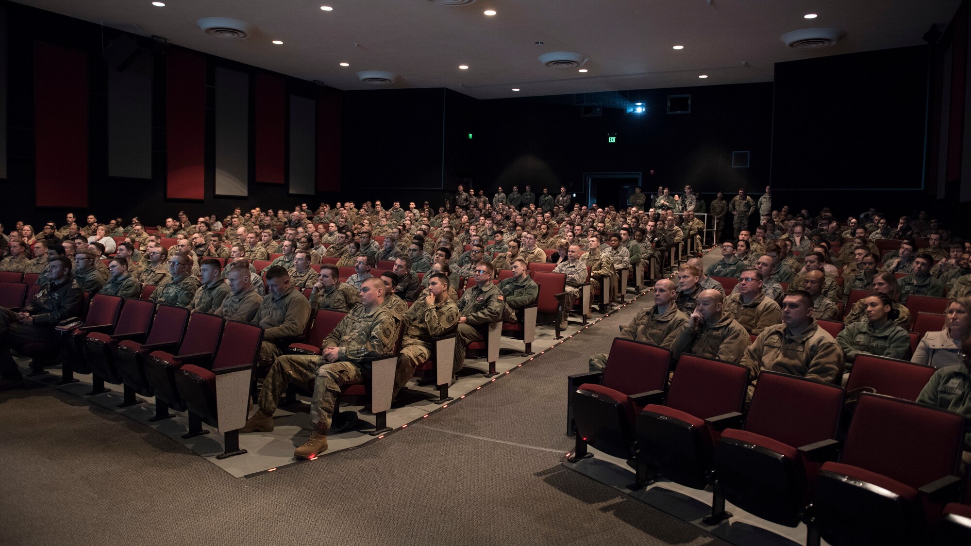 Team Fairchild Airmen pack into the base theater for an all-call meeting at Fairchild Air Force Base, Washington, Jan. 15, 2020. Having a busy, yet successful 2019, Col. Derek Salmi, 92nd Air Refueling Wing commander, spoke to Airmen from around the base to thank and congratulate them for their dedicated efforts and to brief them on the work that lay in store for them in the coming year. (U.S. Air Force photo by Staff Sgt. Ryan Lackey)