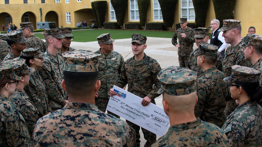 U.S. Marine Corps Gunnery Sgt. Marco A. Corral, the comptroller chief at 12th Marine Corps District, speaks to District Marines and Sailors after an award ceremony at Marine Corps Recruit Depot San Diego, Calif., Jan. 16, 2019. The Commanding General's Cup is a tournament consisting of various sports for tenant commands to compete in to boost morale and get Marines and Sailors to be active by playing sports. (U.S. Marine Corps photo by Sgt. Christian Cachola)
